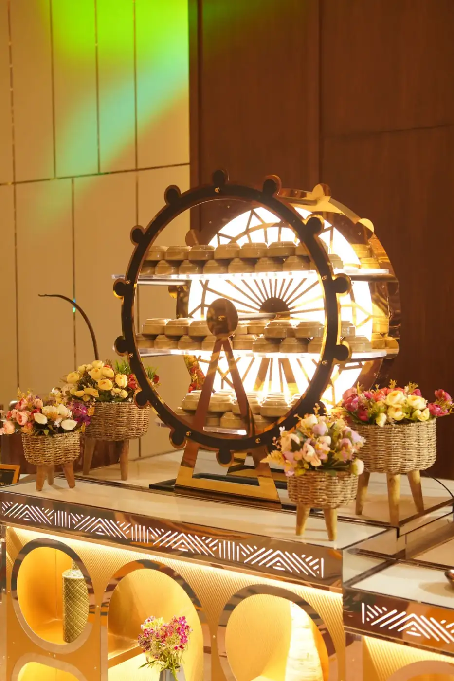 Illuminated dessert wheel display at the banquet buffet