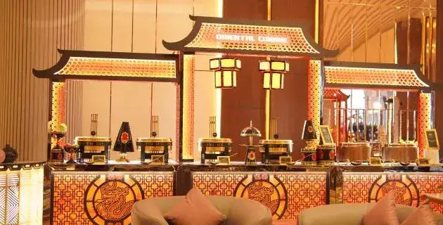Wide view of the Oriental Cuisine live counter with pagoda styling